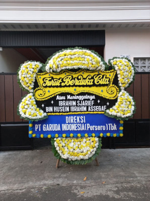 Papan Bunga Duka di Warkar