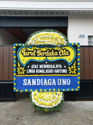 Papan Bunga Duka di Warkar
